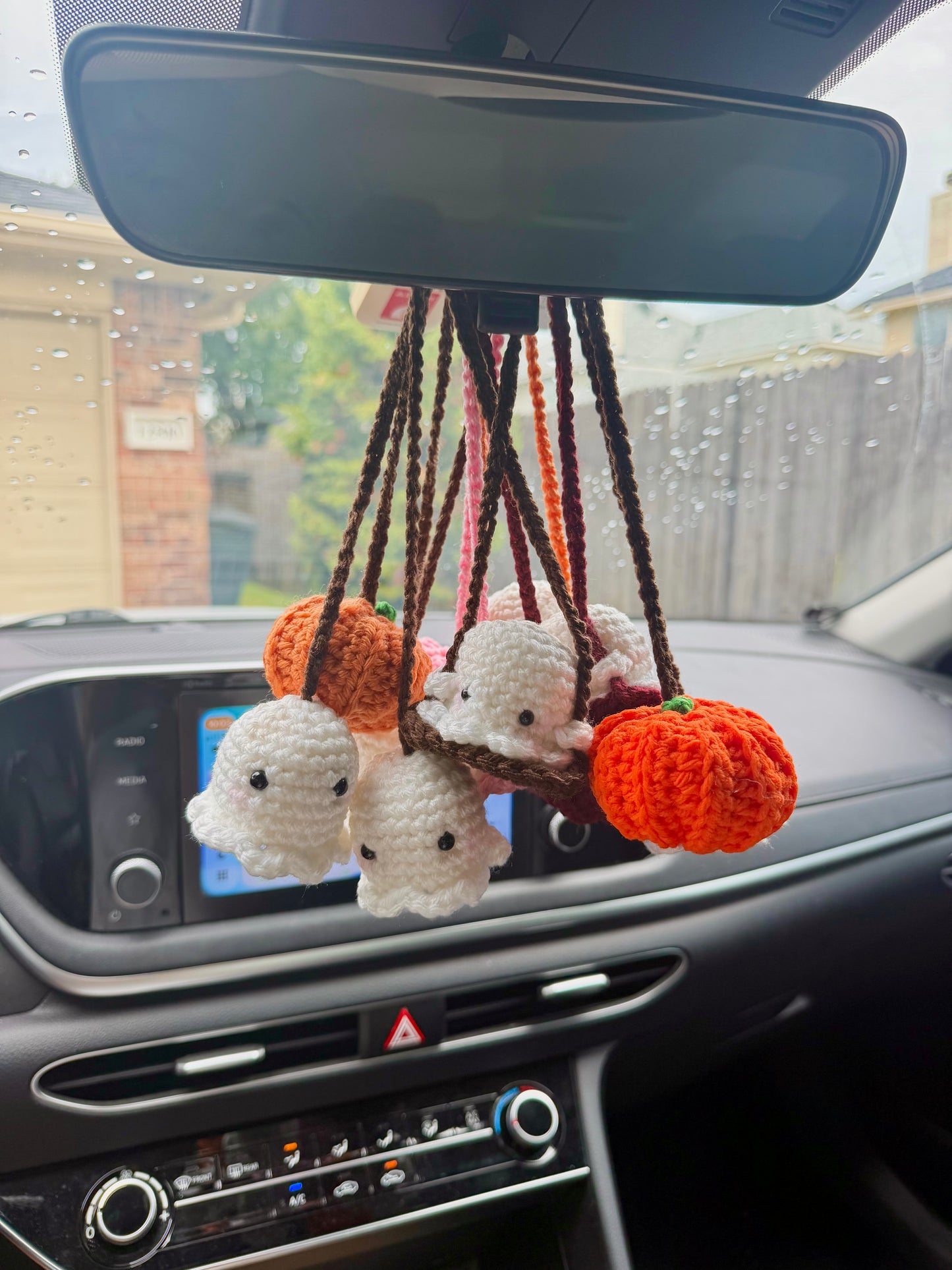 Apricot ghost-kin car hanging